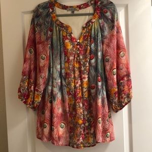 Woman’s plus size sheer top with lining.